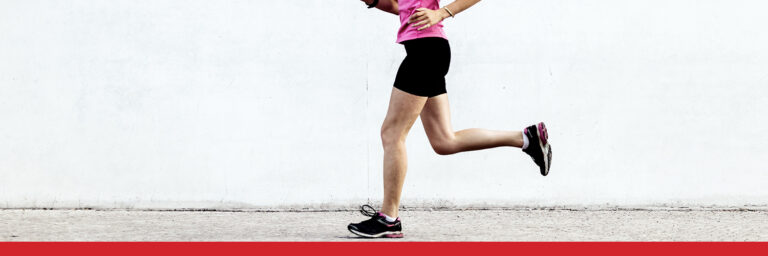 Woman in pink shirt running