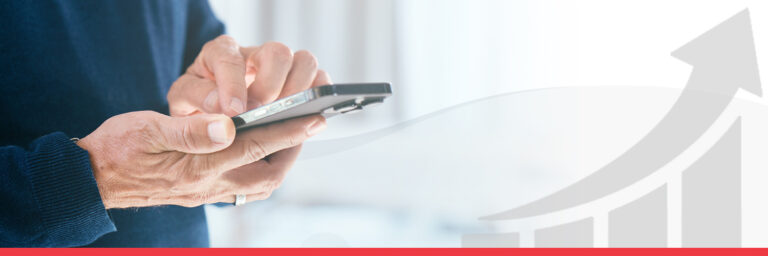 upclose of a man holding a mobile device
